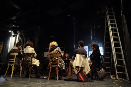 Figure 1b. Workshop and talk about the commons taking place at the main stage of the theater during the activation of Empros by the Mavili initiative in 2011. Photograph by Eleni Tzirtzilaki.